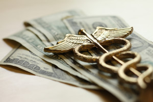 dollars and caduceus